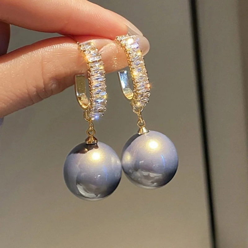 Isla - Eleganta örhängen med pärlor och zirkon