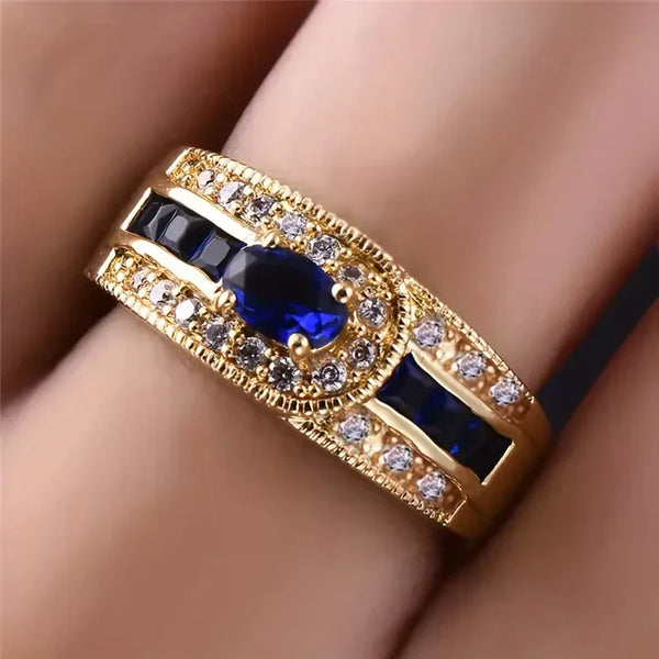Briljantblå ring i guld