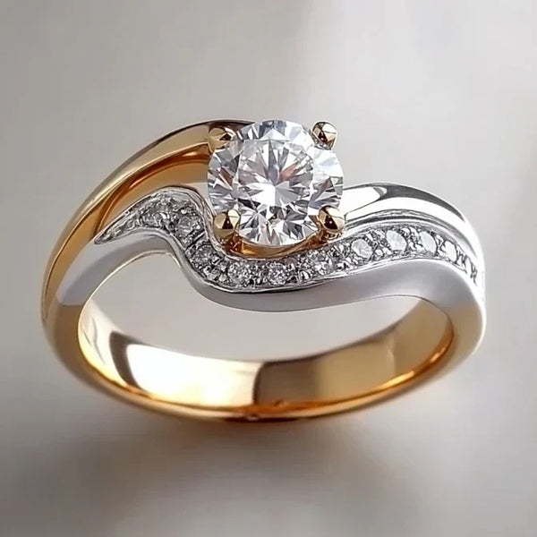Elegant Ring med Vågigt Mönster i Guld och Silver