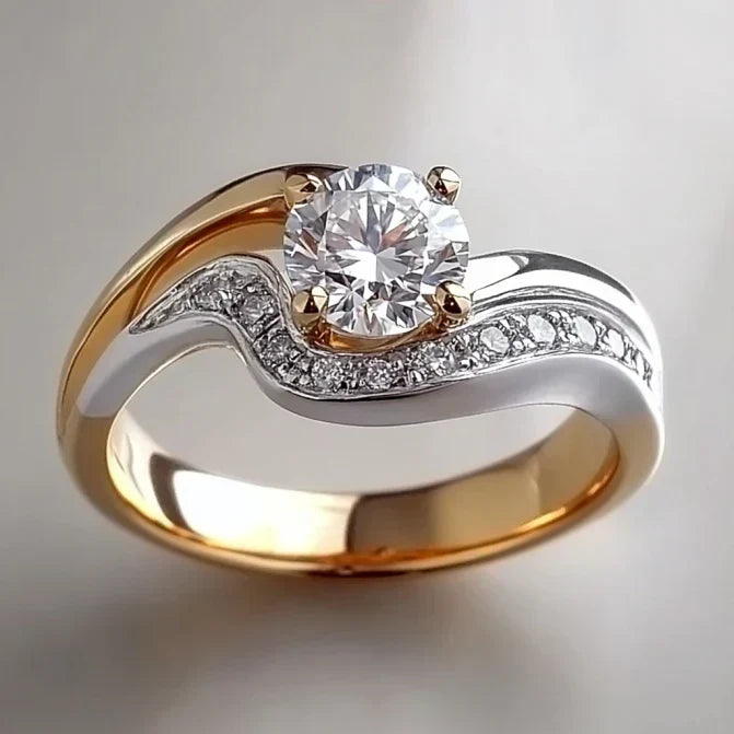 Elegant Ring med Vågigt Mönster i Guld och Silver
